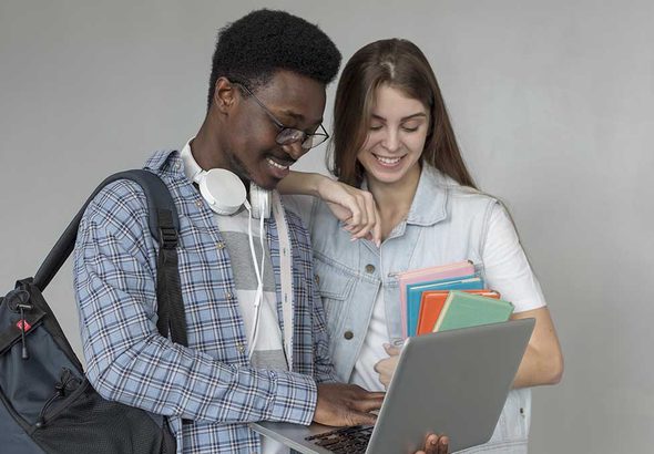 students-with-laptop-medium-shot b