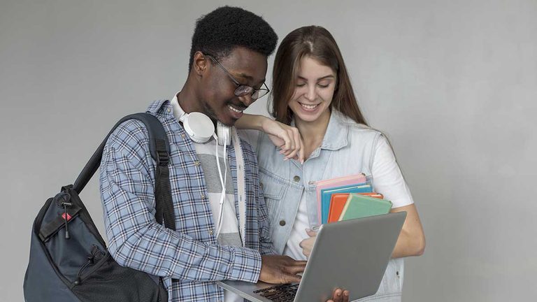 students-with-laptop-medium-shot b